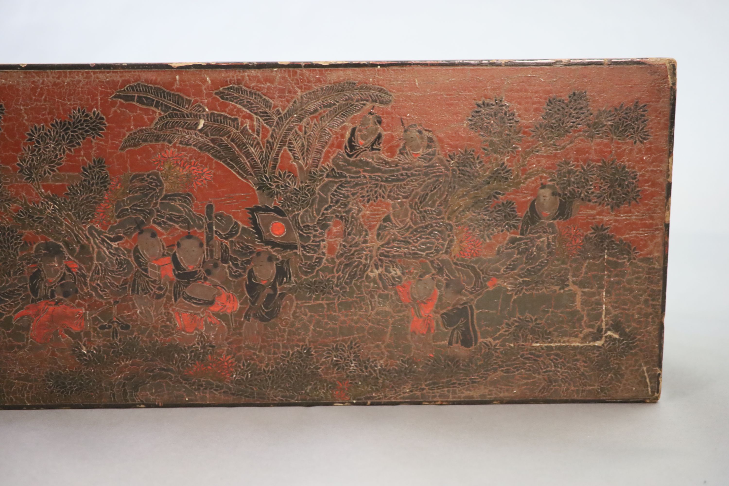 A Chinese coromandel lacquer table or stand, 18th century, 88cm long, 31.5cm long, 35cm high, losses